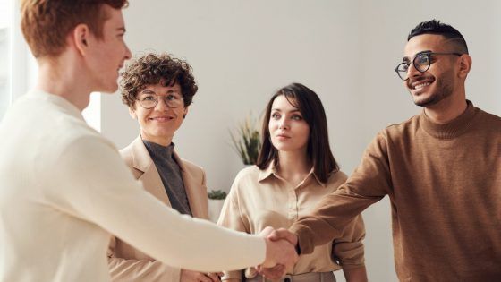 photo of people doing handshakes 3184420 scaled e1630571506369